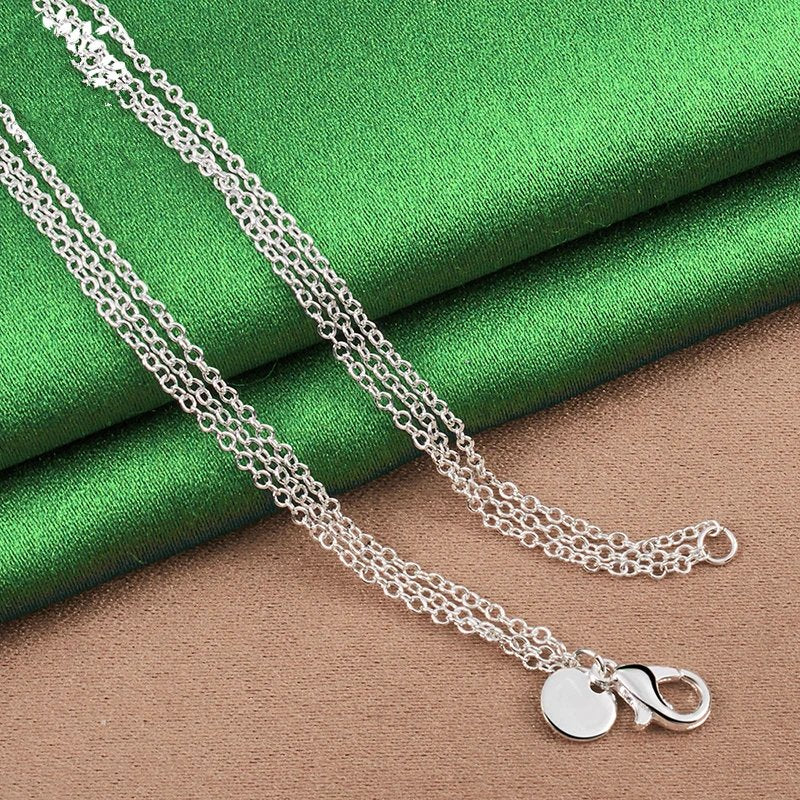 Pure 925 sterling silver three heart pendant necklace.