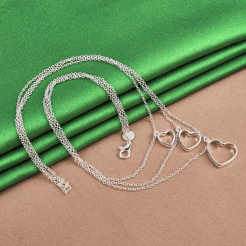 Pure 925 sterling silver three heart pendant necklace.