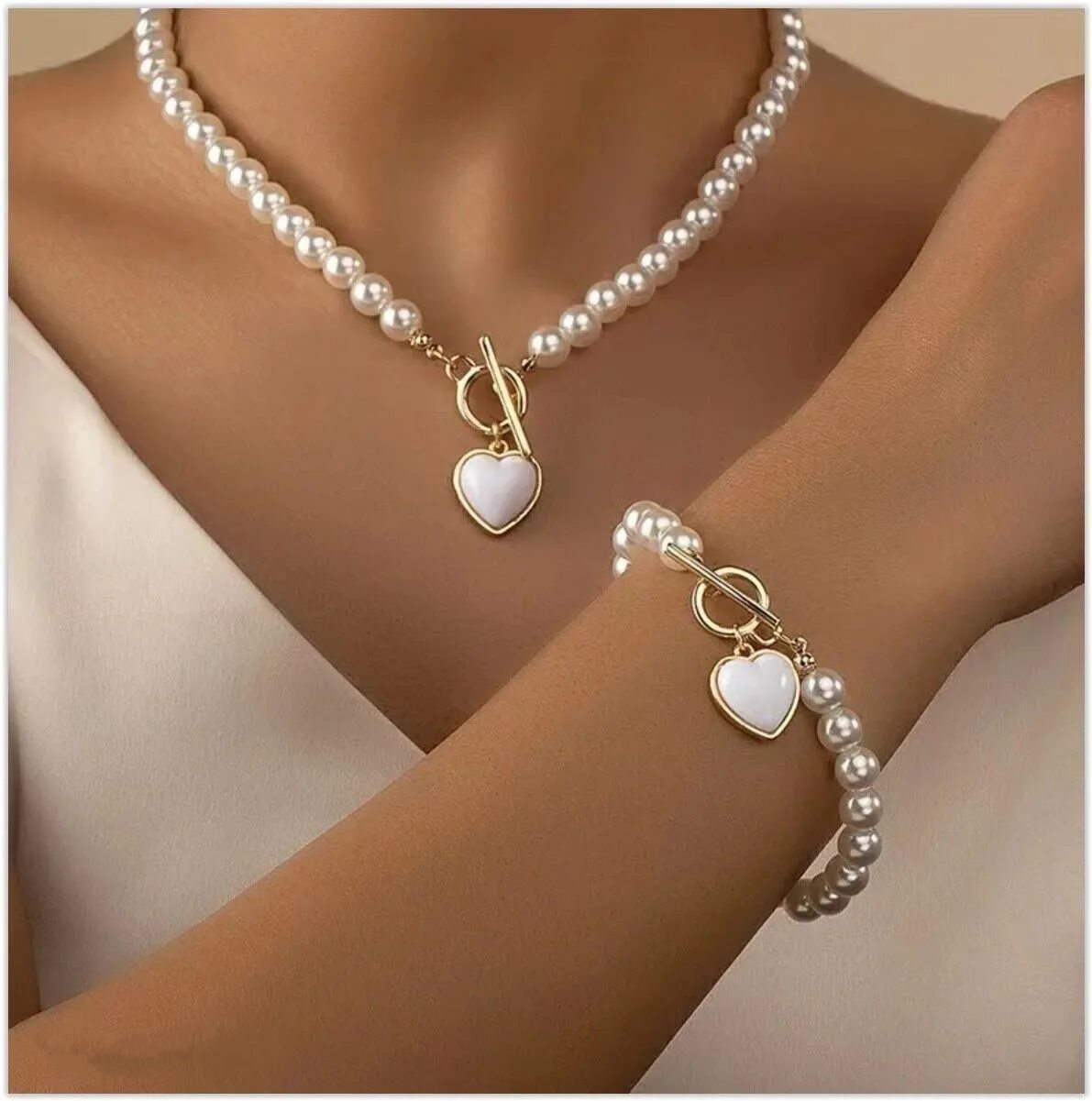 Creative Pearl Heart Necklace & Bracelet.