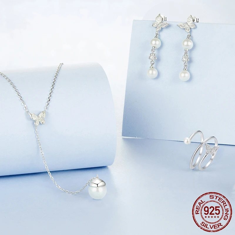 Unique 925 Sterling Silver Charm Ring, Necklace and Earrings.