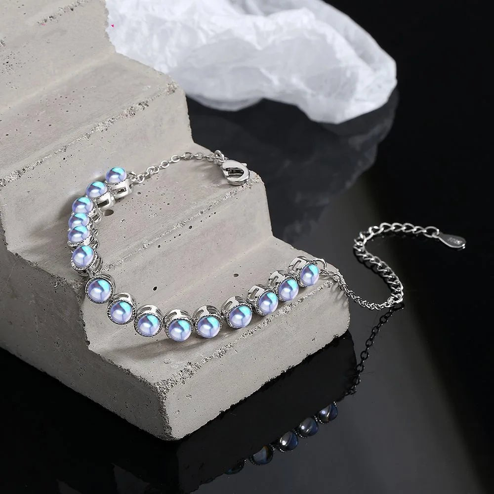 Elegant 925 sterling silver pearl bracelet with extension chain.