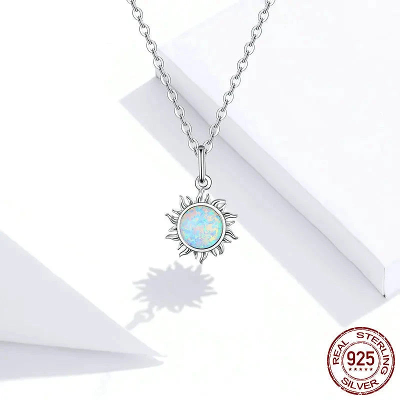 Abla Shane necklaces in 925 Sterling silver white apple sun.