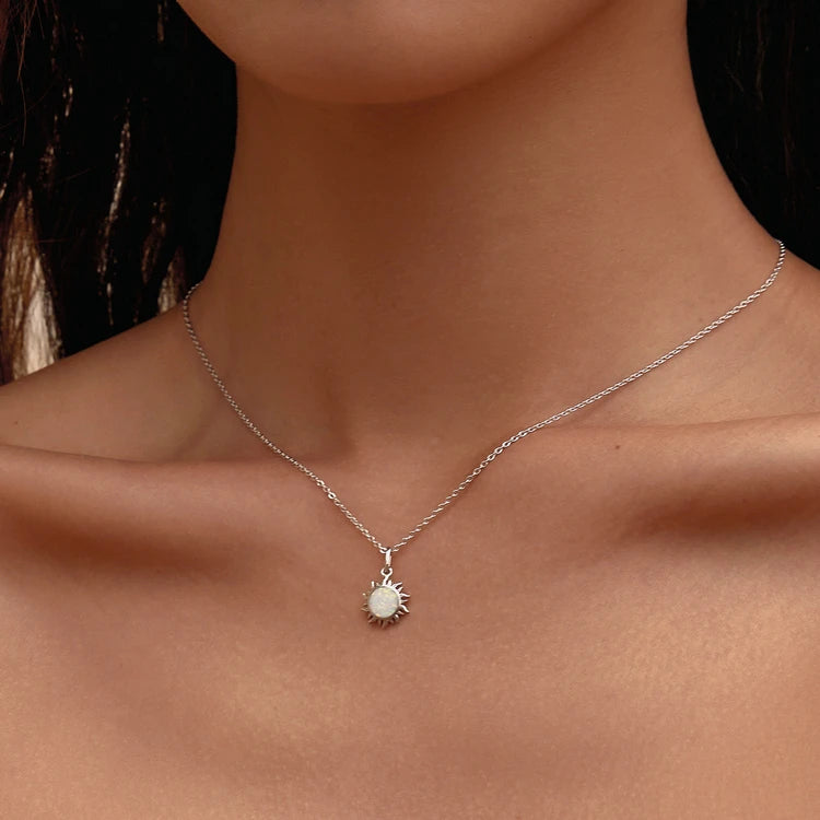 Abla Shane necklaces in 925 Sterling silver white apple sun.