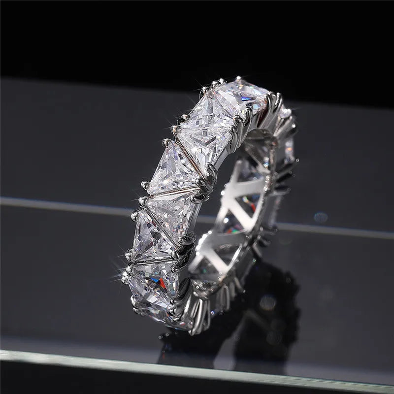 Promise rings, unique triangular cubic zirconia design, top quality.