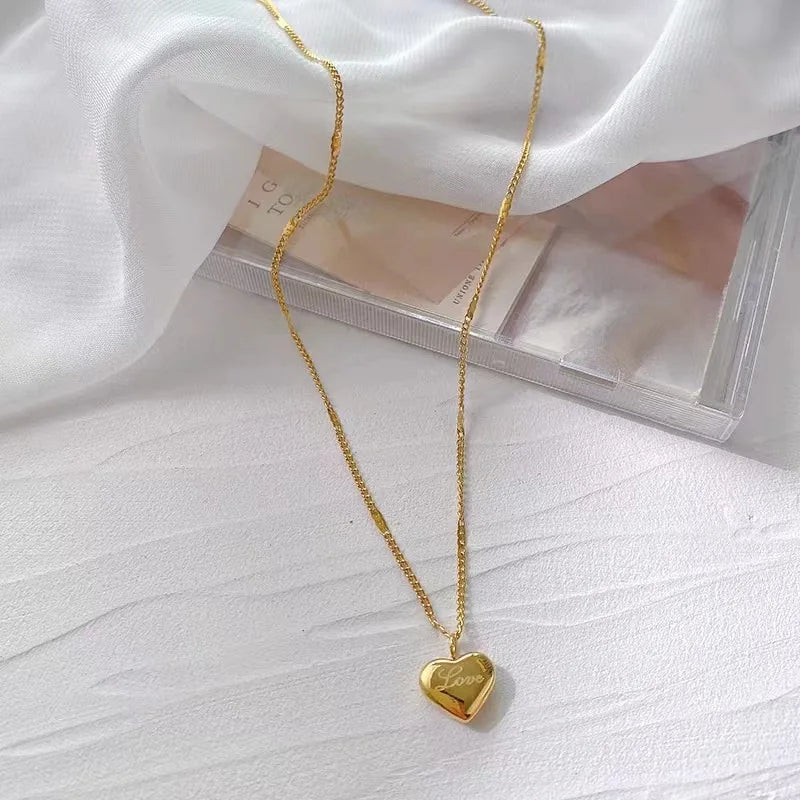 Fashion gold color necklace peach heart engraved love.