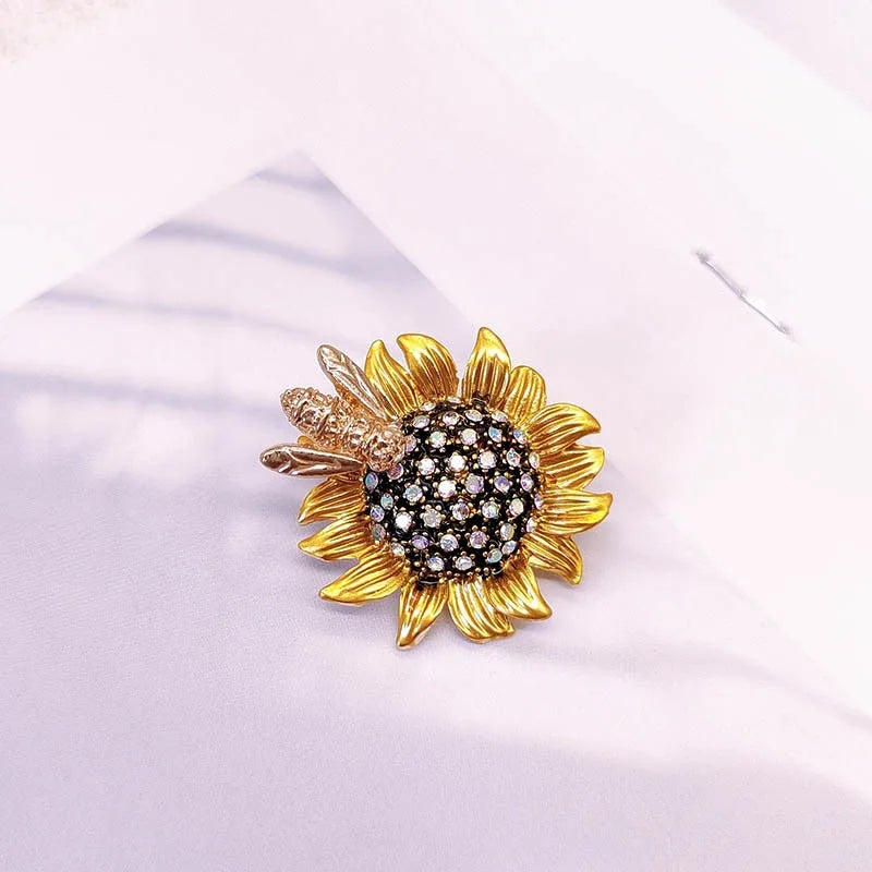 charming sunflower brooch .