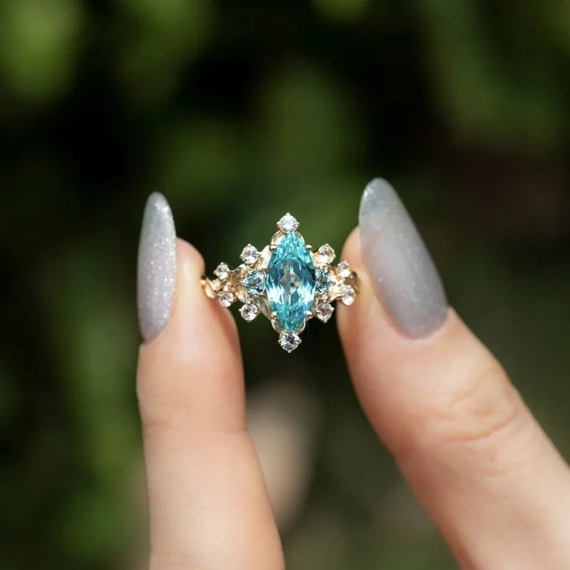 Superb ring. encrusted with blue stones.