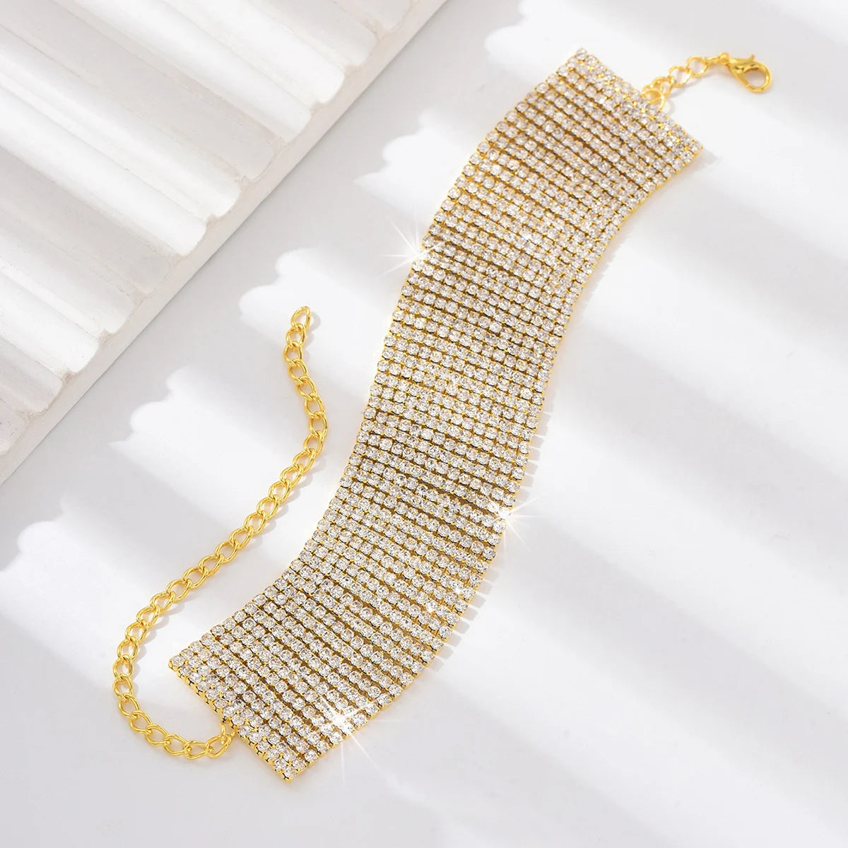 Multi-row rhinestone ankle chain.