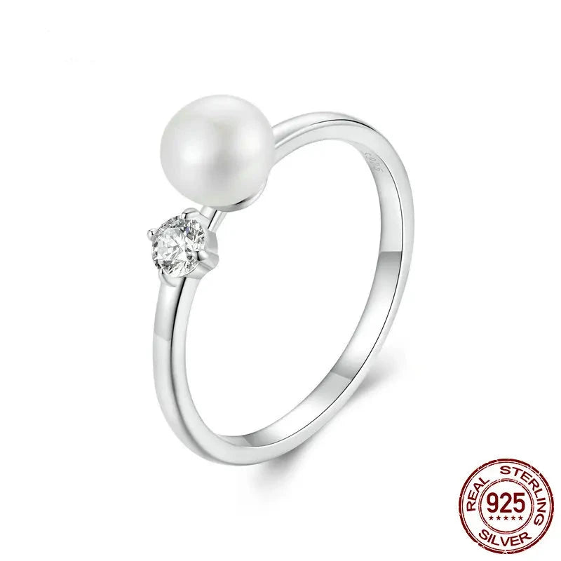 925 Sterling Silver Ring with Natural Pearl and Moissanite.