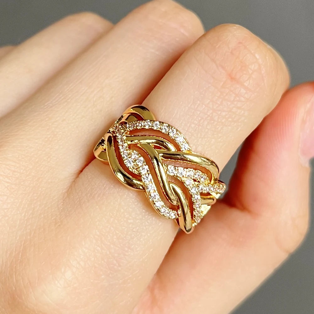 Luxury twisted design ring, encrusted with brilliant cubic zirconias.