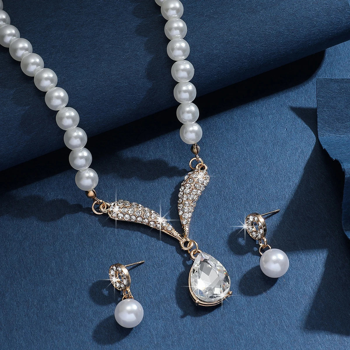 Pearl drop jewelry.