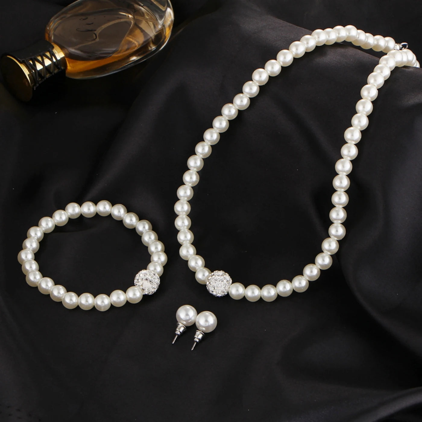 Pearl Jewelry Set, Necklace, Bracelet and Diamond Earrings.