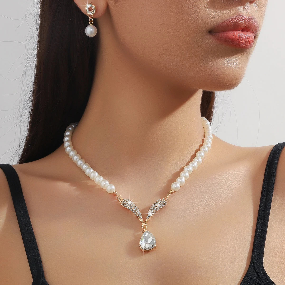 Pearl drop jewelry.