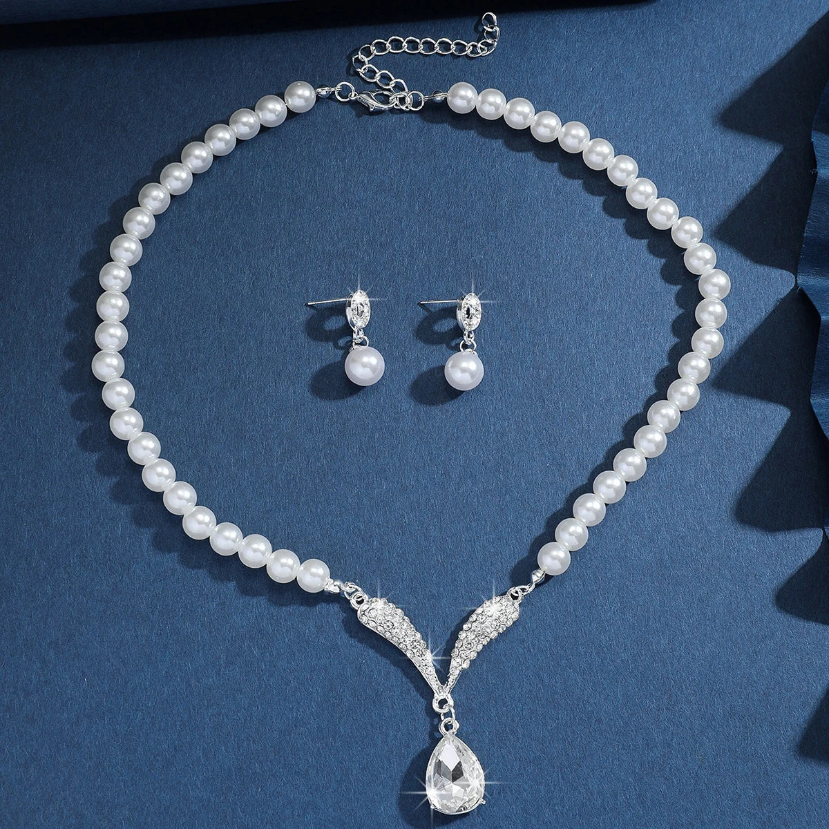 Pearl drop jewelry.