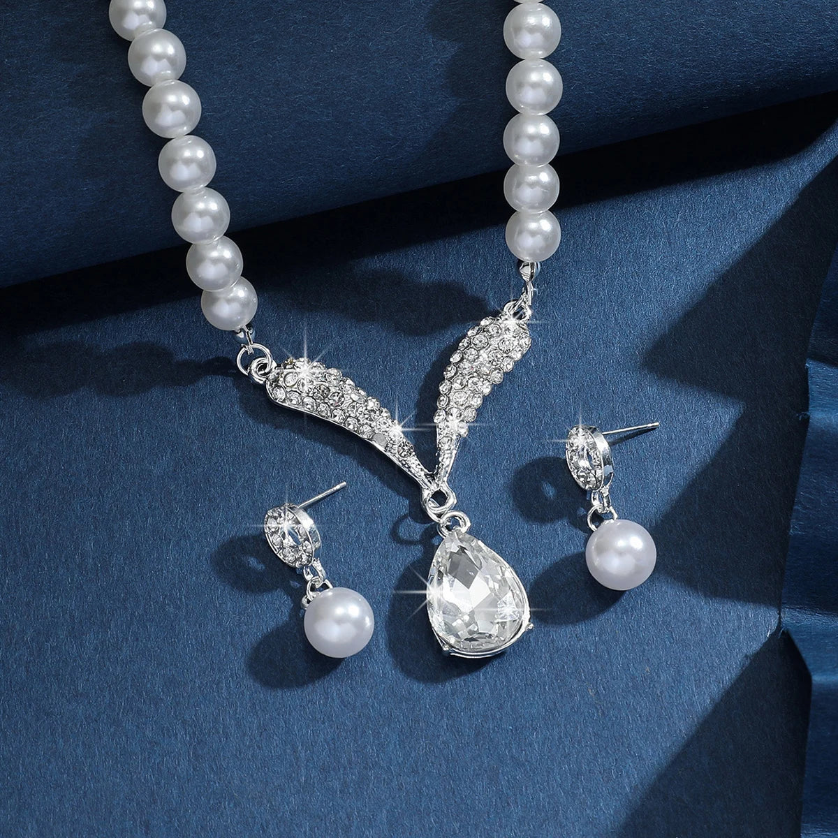 Pearl drop jewelry.