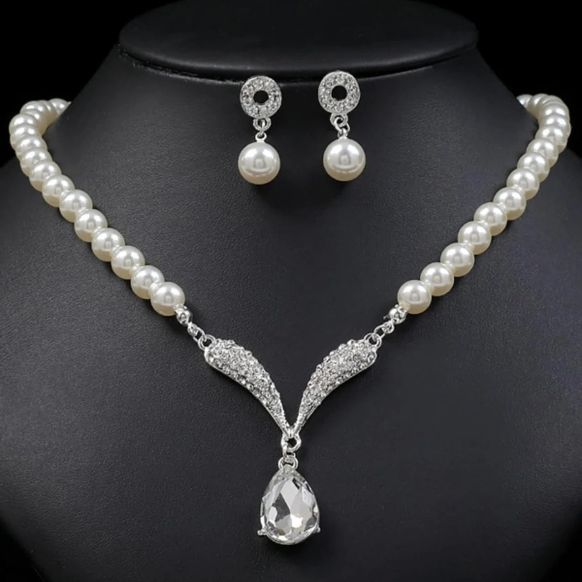 Pearl drop jewelry.