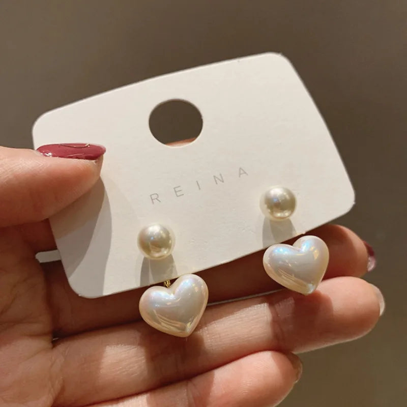 Love heart pearl earrings.