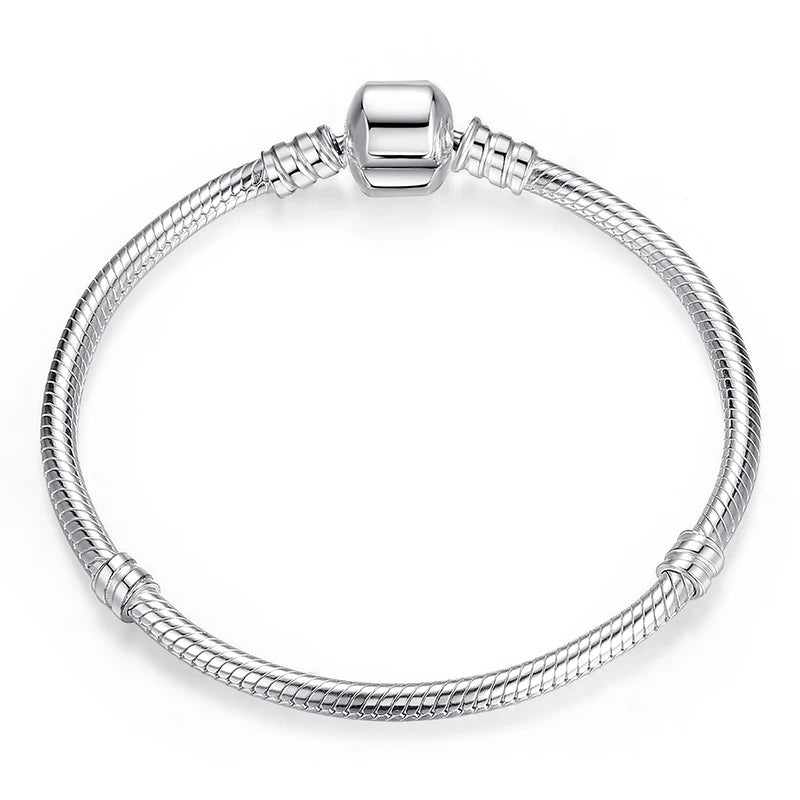 Genuine 925 Sterling Silver charm bracelet.