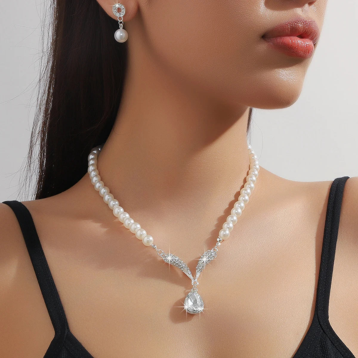 Pearl drop jewelry.