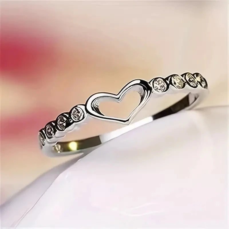 Chic heart shaped rings with sparkling cubic zirconia.