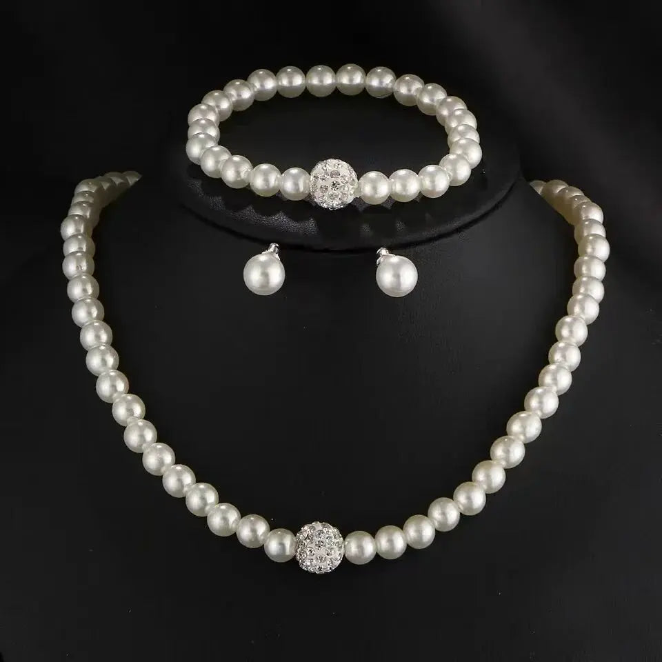 Pearl Jewelry Set, Necklace, Bracelet and Diamond Earrings.