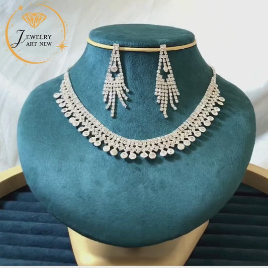 Diamond earrings and necklace, luxury accessories.