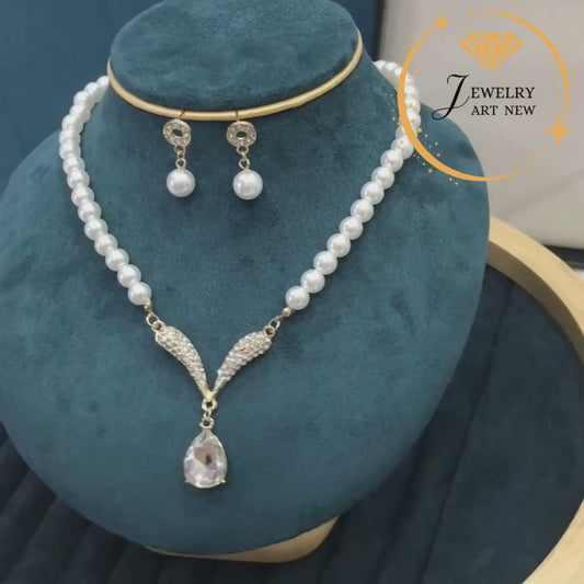 Pearl drop jewelry.